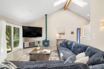 Vaulted ceilings with Propane standalone stove.