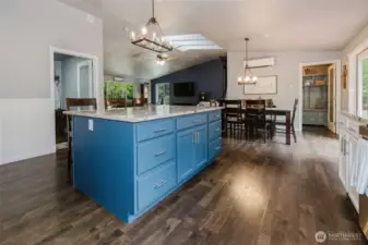 Custom finishes, designer lighting, and warm inviting colors throughout.