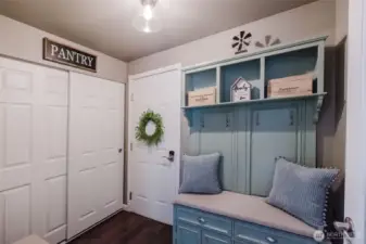 The sweetest mudroom I've seen, with second pantry and entrance to the oversized, attached garage.  There is a separate laundry room just down the hall.
