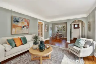 In front of fireplace looking to dining area.