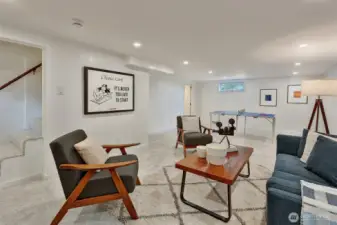 Lower level rec room is cheery and bright.