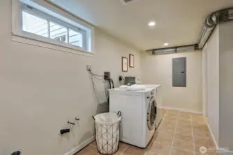 Laundry room with extra connections for potential sink.
