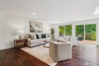 Large windows let fantastic natural light and green views pour in all year long.