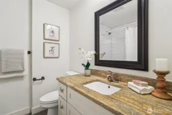 Handy full bathroom on the main level is great for guests.