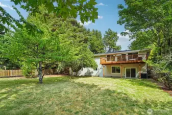 Fully fenced for privacy, pets and play - and thanks to all the trees, you can barely even see your neighbors! Apple, cherry and pear trees produce bountiful harvests every summer.