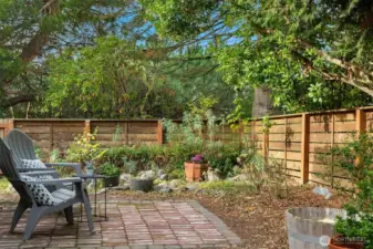 Charming brick patio is made from salvaged brick from Georgetown Brewing Company.