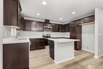 Photographs are for illustrative purposes only. Features, finishes, interior/exterior colors, landscaping and floorplan shown may vary from actual homes built.