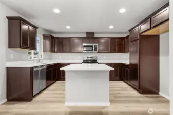 Photographs are for illustrative purposes only. Features, finishes, interior/exterior colors, landscaping and floorplan shown may vary from actual homes built.