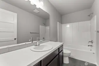 Photographs are for illustrative purposes only. Features, finishes, interior/exterior colors, landscaping and floorplan shown may vary from actual homes built.