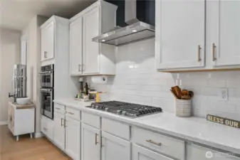 Any chef who loves to entertain will appreciate the kitchen’s updated quality Kitchen Aid appliances including double ovens and a gas range, a Samsung refrigerator, a large island with deep farmers-style sink, and incredible walk-in pantry with beverage cooler.
