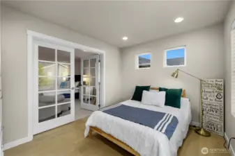 Upstairs, the expansive primary awaits, offering a large walk-in closet with organization and a lovely en suite bath with dual vanities, walk-in shower and soaking tub. Another bedroom connected through French doors could also be a nursery or large sitting room.