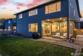 back of the house pictured is the covered outdoor living space and the upper room is the newly permitted 5th bedroom or office, sitting space or nursery planning??