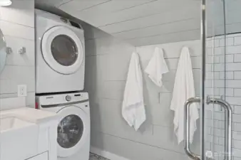 Washer/Dryer in upper-level bathroom, stays with the home.