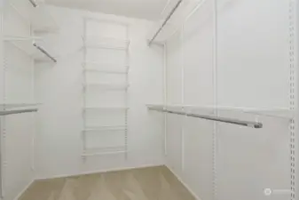 Walk in closet, located within the primary bathroom.
