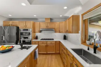 Oversized stainless steel sink to fit all those baking sheets in.