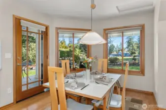 Kitchen eating area with access to covered deck.