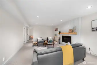 Recessed lighting & newly built fireplace surround.