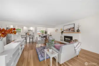 Stunning newly finished white oak hardwoods run throughout the main floor.