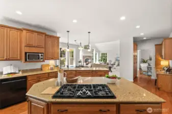 The open-concept floor plan is bright and airy, allowing conversations to flow effortlessly from room to room.
