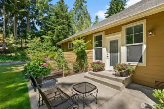 A private patio off the primary bedroom offers a peaceful spot to enjoy your first cup of coffee each morning as the day awakens.