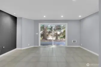Open-concept great room combines kitchen, dining, and living areas