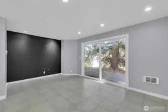 Open-concept great room combines kitchen, dining, and living areas.