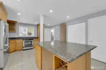 Open-concept kitchen flows into main living area