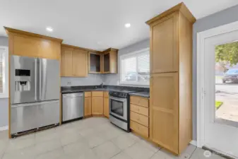 Sleek granite countertops and full stainless steel package