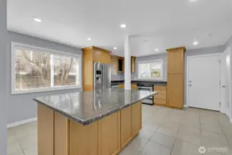 Open-concept kitchen flows into main living area