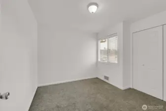 Spacious primary bedroom.