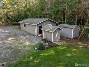 Detached garage and outbuildings.