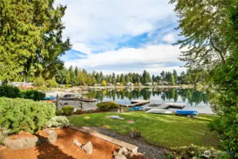 Lovely no bank lakefront with grassy and gravel