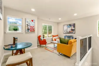 Upstairs loft rec room with so much natural light