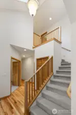 Step inside to soaring vaulted ceiling and light-filled living spaces that create an inviting, airy atmosphere.