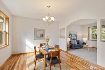 Gorgeous refinished hardwood floors are featured throughout the formal dining room, adding timeless elegance.