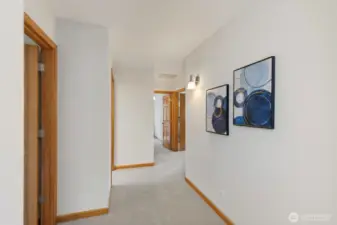 Upstairs hallway with 4 bedrooms and full bathroom.