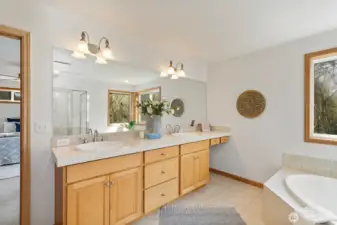 Primary en suite bathroom featuring a dual-sink vanity for convenience and functionality.