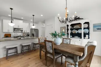 Dining space connected to kitchen and living areas