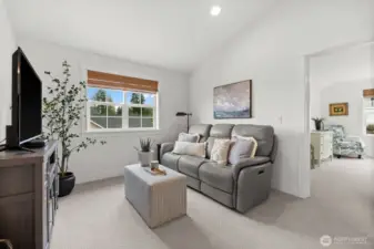 Upstairs den for relaxing, reading, or movie nights