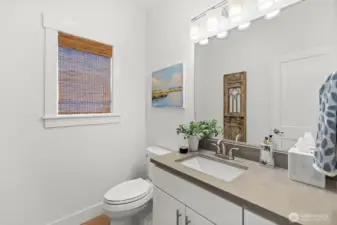 Upstairs bath with clean, bright finishes