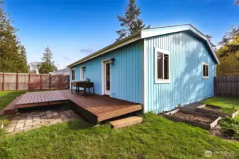 Newly remodeled back deck with plenty of space for outdoor dining and relaxation.