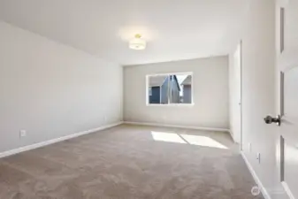 **Photos of simlar floorplan in another community. Features and specs will vary**