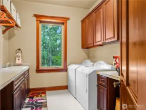Utility room steps from Primary BR