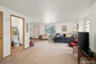 1408 open concept living w/ 1/2 bathroom on the main level