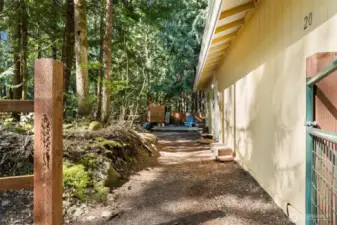 Large front and side yards are totally enclosed.