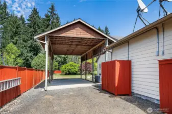 Versatile side yard features a massive 37x17 covered RV carport, a heat pump for year-round comfort, and a wired generator for peace of mind—ready for whatever life brings.