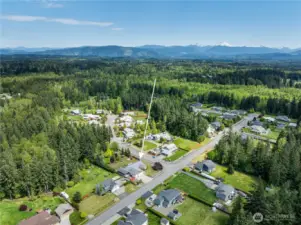 Aerial view looking NE. The Cascade Mountains are in the background.