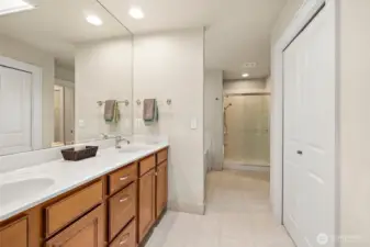 Spacious en-suite bath with large linen closet.