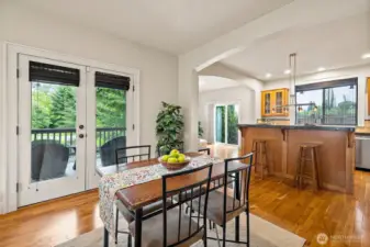 French doors lead to the main level patio that overlooks the pond and wetlands.