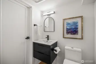 Brand new half bath in fully finished basement